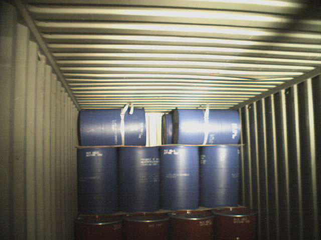 Tying down cargo loads in flatracks